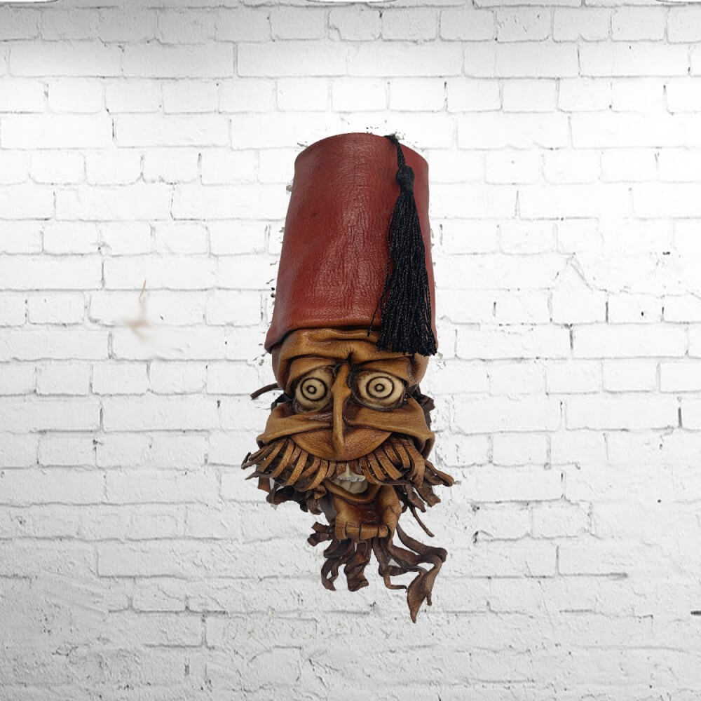 Fez hat moulded leather wall mask